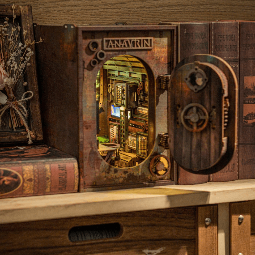 The finished Abandoned Submarine Book Nook Kit displayed on a bookshelf