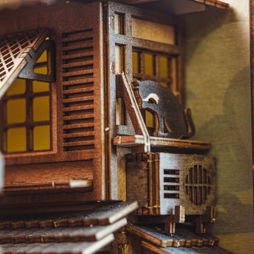 Black cat inside Sawara Town Book Nook Kit