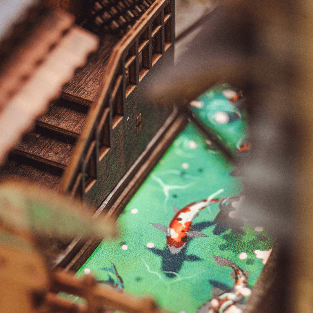 Miniature canal bridge, river and koi fishes inside Sawara Town Book Nook