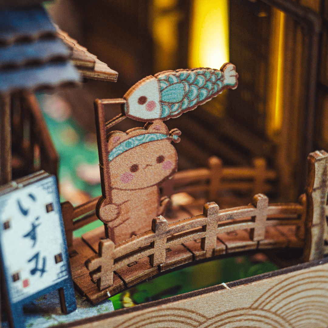 Close-up of miniature Japanese wooden houses in Sawara Town Book Nook
