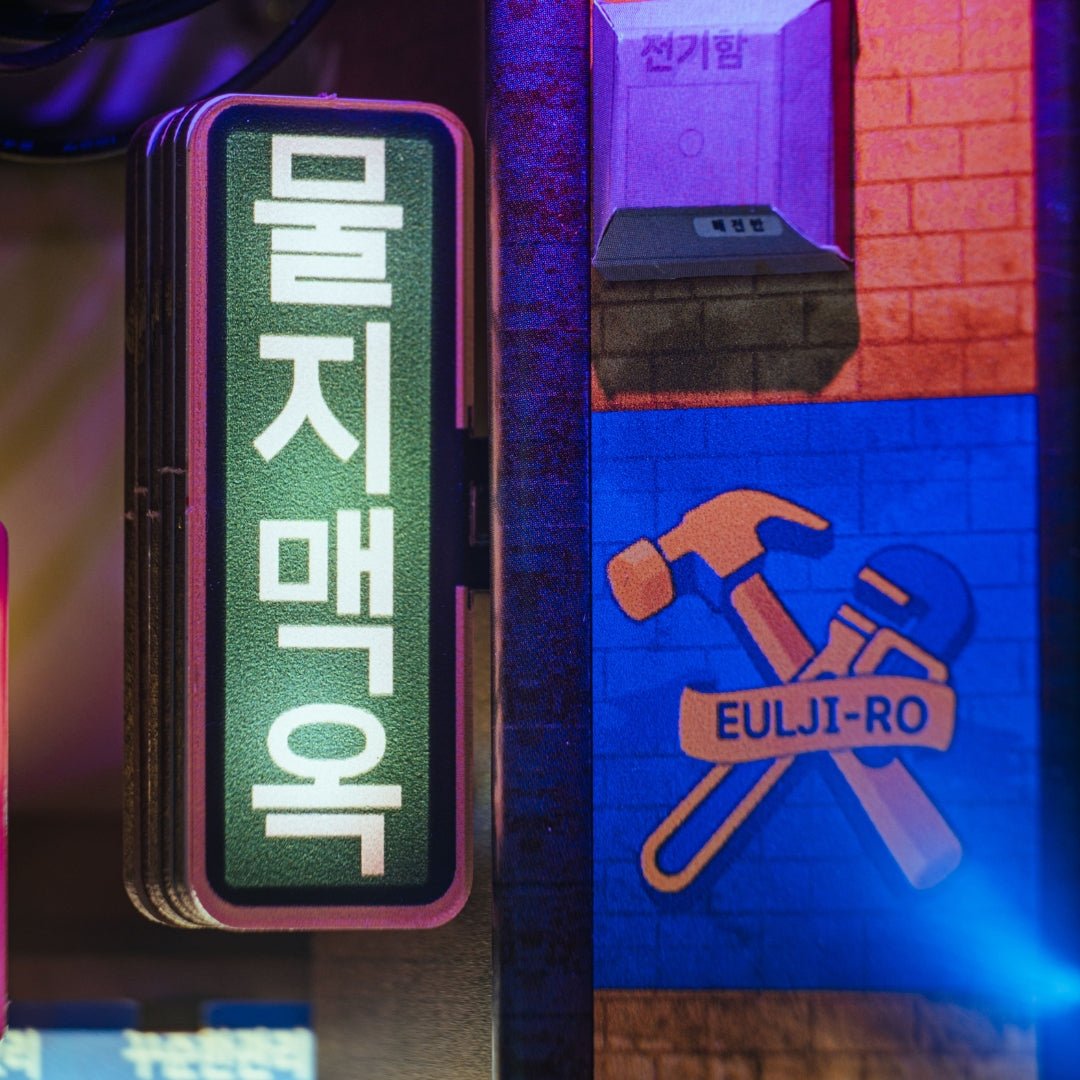 Detailed view of miniature windows and metal frames from the Hipjiro Book Nook Kit