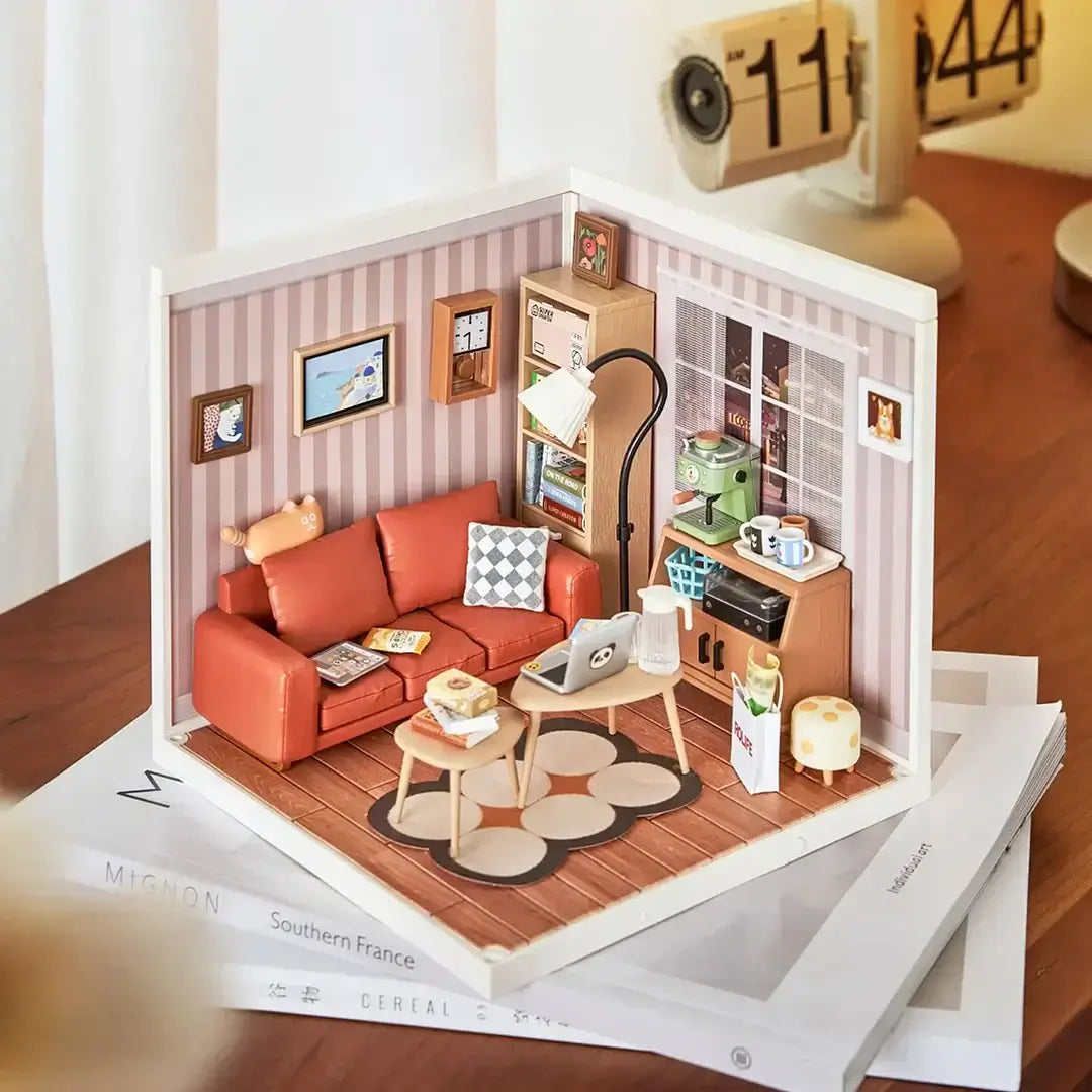 Cozy Living Lounge DIY Plastic Miniature House with detailed interior including a couch, coffee table, lamp, and various mini collectibles.