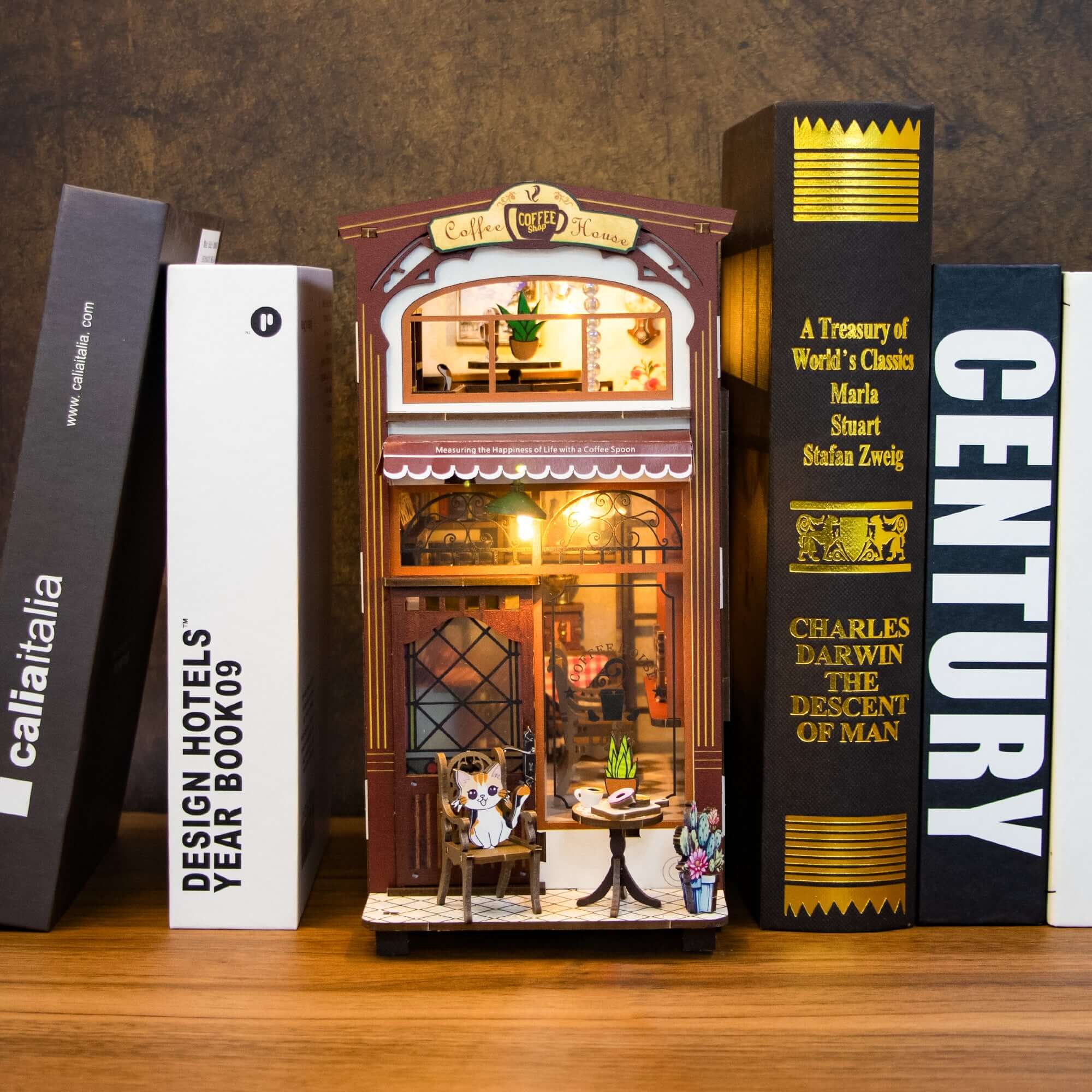 Coffee House DIY book nook music box displayed between books, perfect craft gift for bonding and relaxing