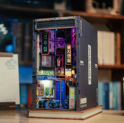 Side view of the Seoul Hipjiro Book Nook Kit with glowing neon signs