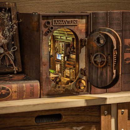 The finished Abandoned Submarine Book Nook Kit displayed on a bookshelf