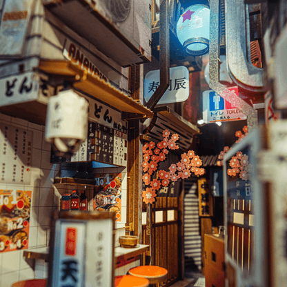 Close-up of glowing paper lanterns inside the Omoide Yokocho Book Nook