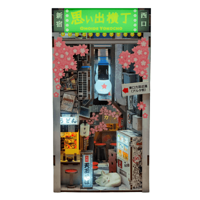 Omoide Yokocho Book Nook Kit front view with lantern-lit alley and shops