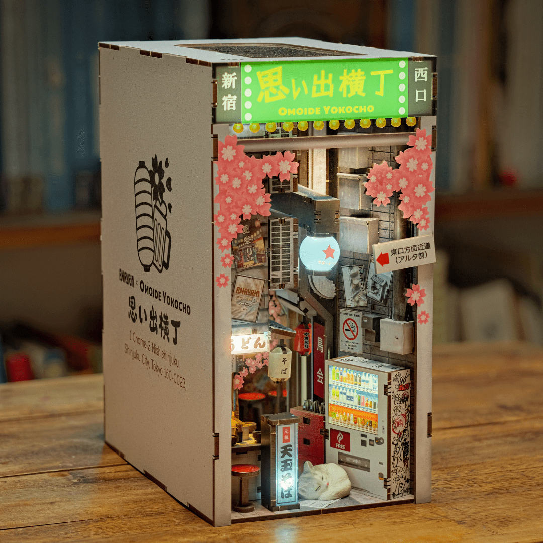 Omoide Yokocho Book Nook Kit side view with lantern-lit alley and shops