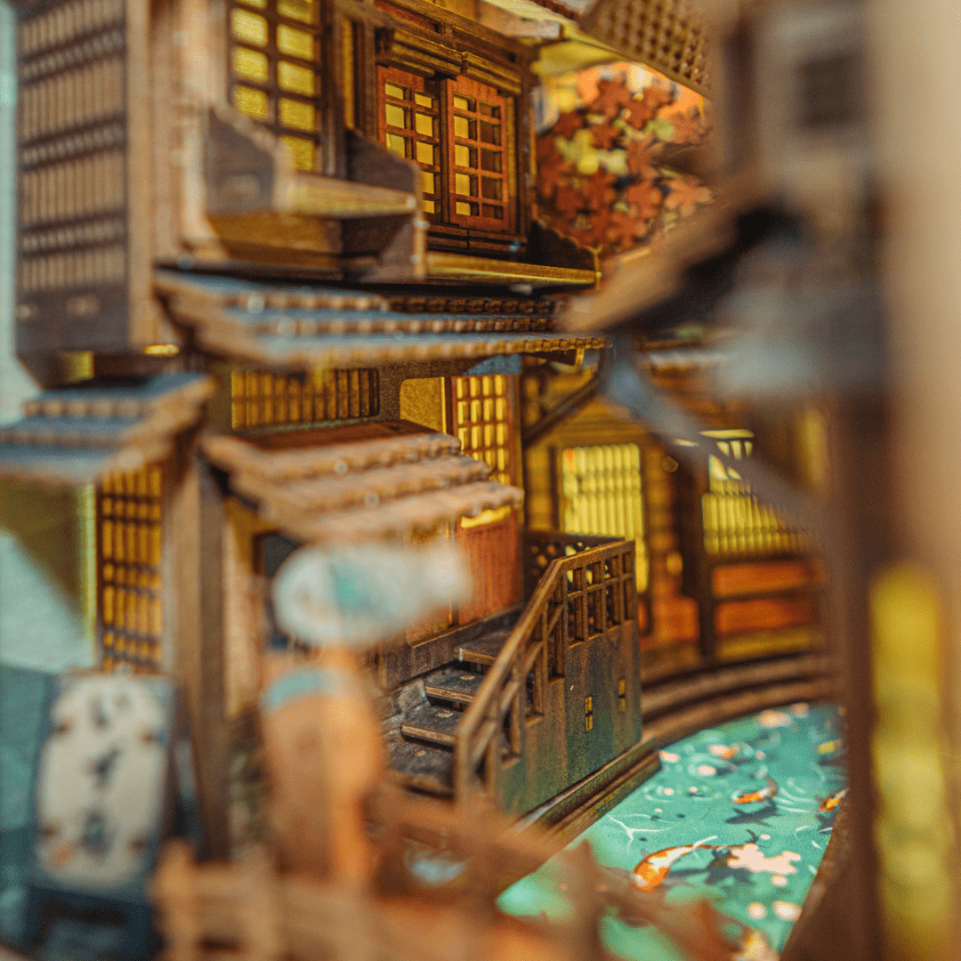 Miniature canal bridge, with river, and koi fishes inside Sawara Town Book Nook