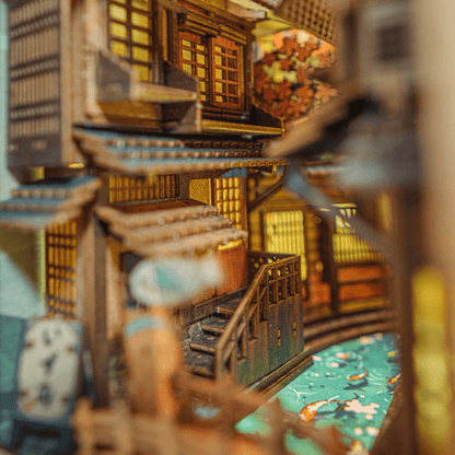 Miniature canal bridge, with river, and koi fishes inside Sawara Town Book Nook