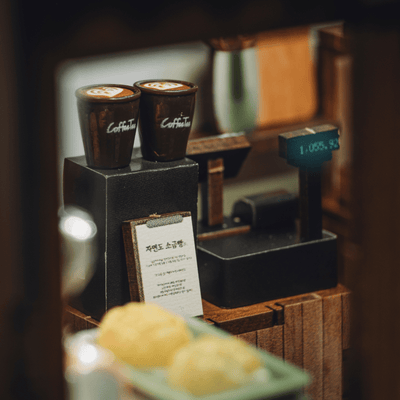 Inside view of Hanok-style miniature bakery craft kit with coffee counter