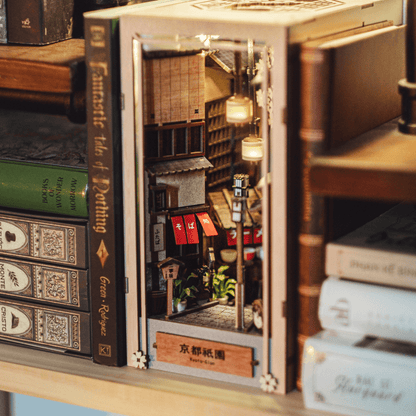 Kyoto Gion Book Nook glowing on a bookshelf with warm lights