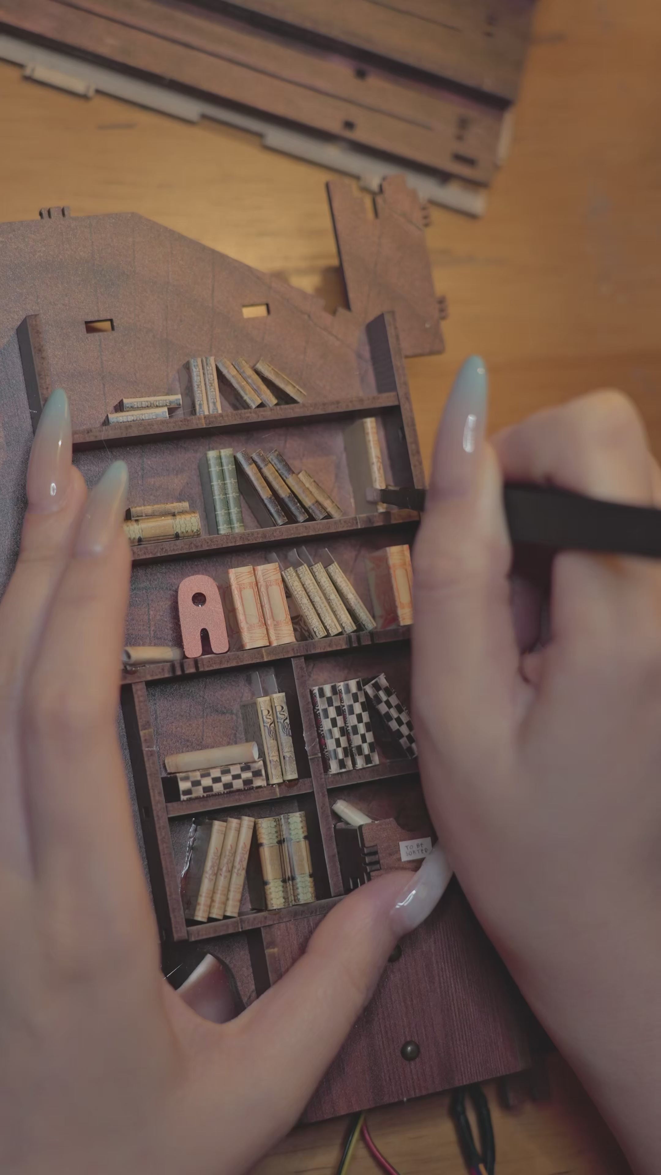 Load video: Cats Crossing DIY Book Nook Kit by ANAVRIN