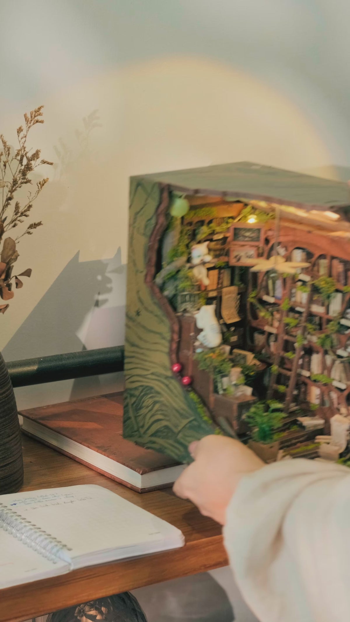 If you love books, cats, and a little magic, this is your world to build.