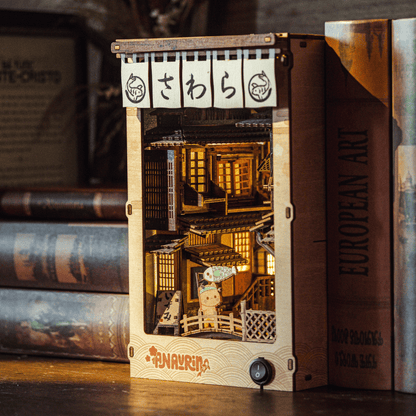 Cozy night scene glowing warmly inside the Sawara Town Book Nook