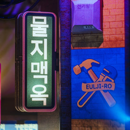 Detailed view of miniature windows and metal frames from the Hipjiro Book Nook Kit